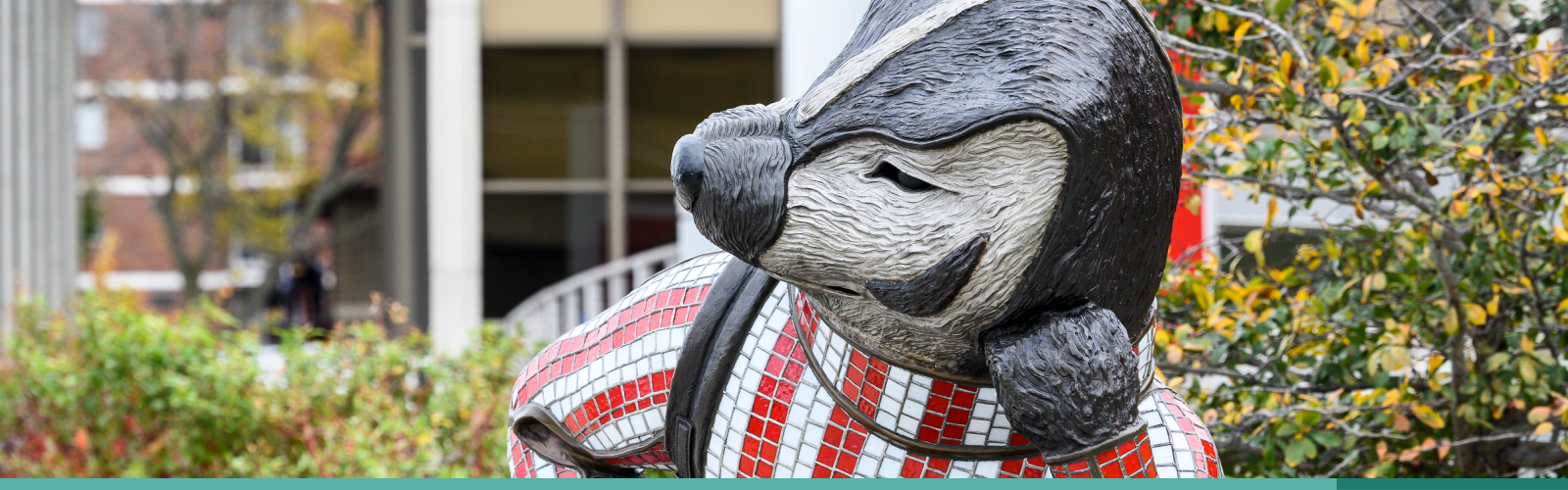 Sculpture of a studious-looking Bucky Badger