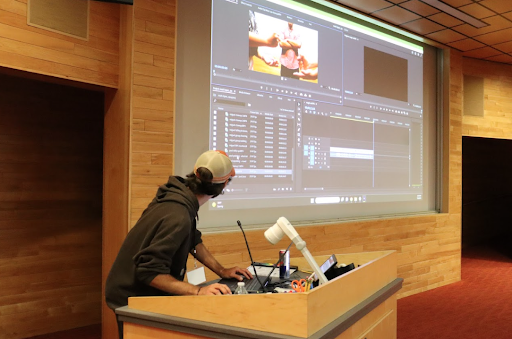 Instructor Noah Lopez teaching film editing in Adobe Premiere to the sophomores.