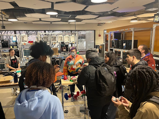 ITA students learn from CEETE Director, Erica Hagen at the Makerspace tour.