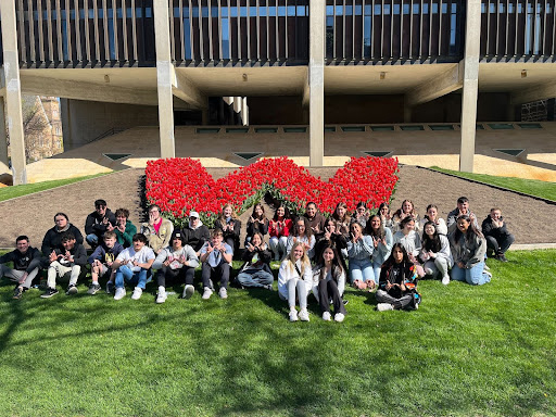 ITA students posing by floral letter W