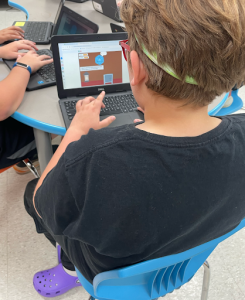 Orchard Ridge 5th Grade student playing the game they proposed, designed by a student at ITA. ITA Roadshow, May 29, 2024.