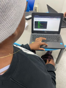 Orchard Ridge 5th Grade student exploring the menu of games created by ITA students and developed by their classmates. ITA Roadshow, May 29, 2024.